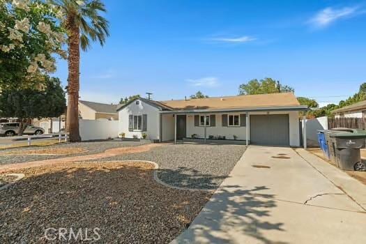 4775 Beverly Ct, Riverside, CA 92506 - ranch-style home featuring concrete driveway and a garage