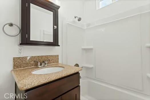 4775 Beverly Ct, Riverside, CA 92506 - full bath featuring vanity and tub / shower combination