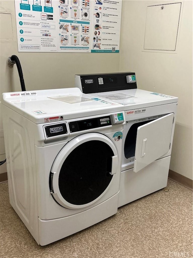 800 W 1st St Unit 2002, Los Angeles, CA 90012 - washroom with washer and clothes dryer and light floors