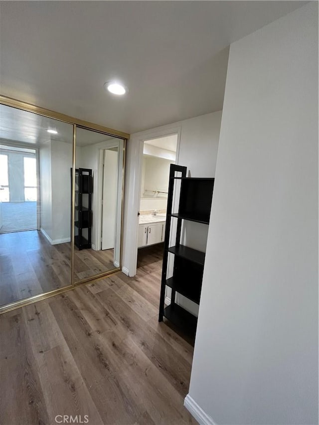 800 W 1st St Unit 2002, Los Angeles, CA 90012 - hall with wood finished floors and recessed lighting