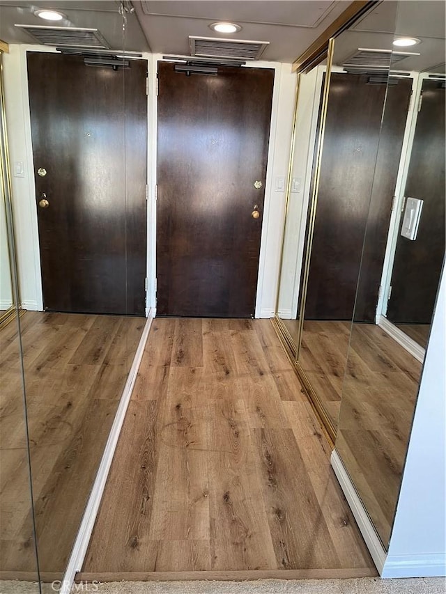 800 W 1st St Unit 2002, Los Angeles, CA 90012 - hall featuring wood finished floors