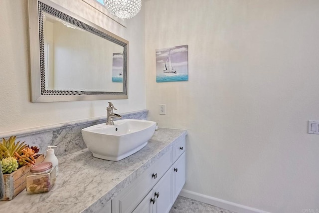 6229 Caminito Basilio, San Diego, CA 92111 - bathroom with vanity and baseboards