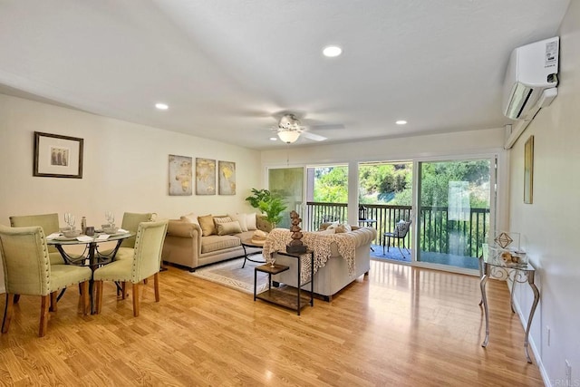 6229 Caminito Basilio, San Diego, CA 92111 - living room with a wall mounted air conditioner, ceiling fan, light wood-style flooring, and recessed lighting
