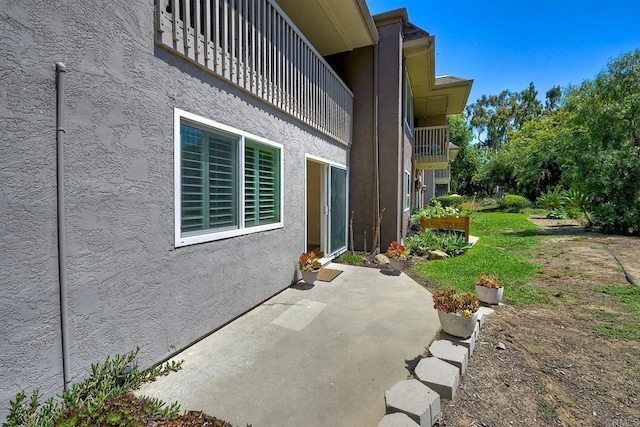6229 Caminito Basilio, San Diego, CA 92111 - entrance to property featuring stucco siding and a patio