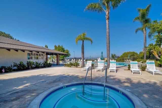 6229 Caminito Basilio, San Diego, CA 92111 - community pool featuring a community hot tub and a patio