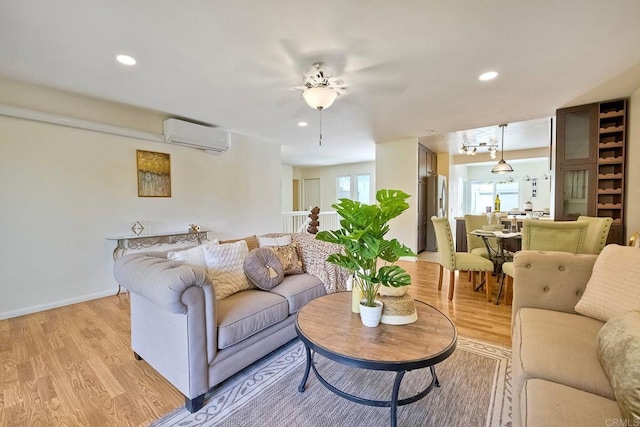 6229 Caminito Basilio, San Diego, CA 92111 - living room featuring a wall mounted AC, light wood-type flooring, recessed lighting, and a ceiling fan