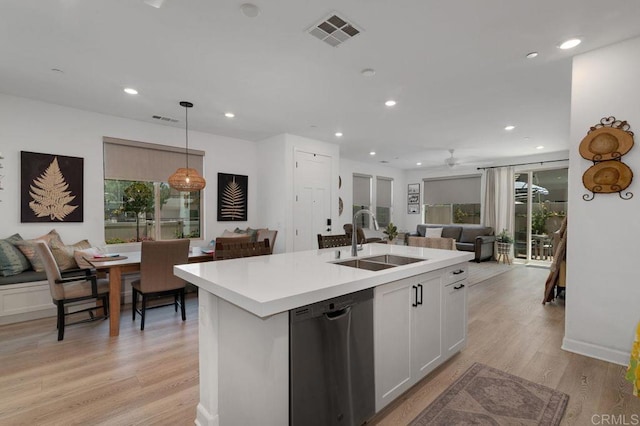2051 Julie Dawn Pl, Escondido, CA 92026 - kitchen featuring open floor plan, stainless steel dishwasher, light countertops, light wood-style flooring, and recessed lighting