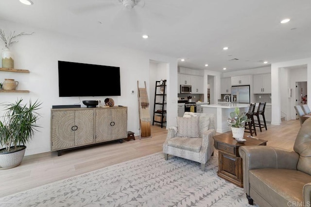 2051 Julie Dawn Pl, Escondido, CA 92026 - living room featuring light wood finished floors, a ceiling fan, and recessed lighting