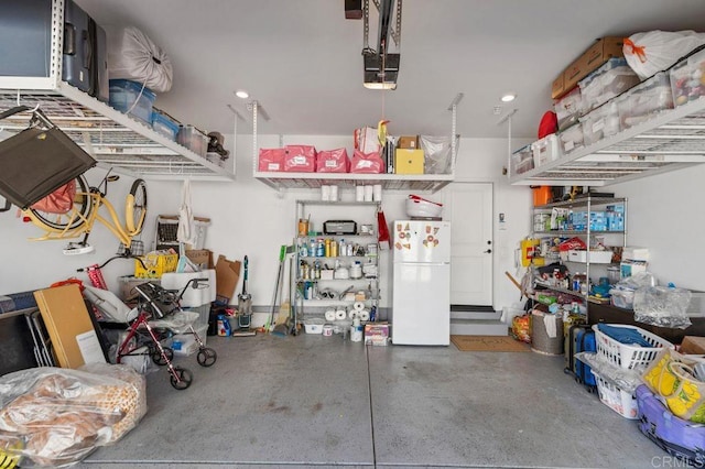 2051 Julie Dawn Pl, Escondido, CA 92026 - garage featuring freestanding refrigerator, recessed lighting, and a garage door opener
