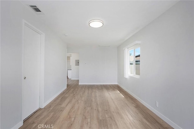 1435 E Colon St, Wilmington, CA 90744 - empty room with light wood-type flooring and baseboards