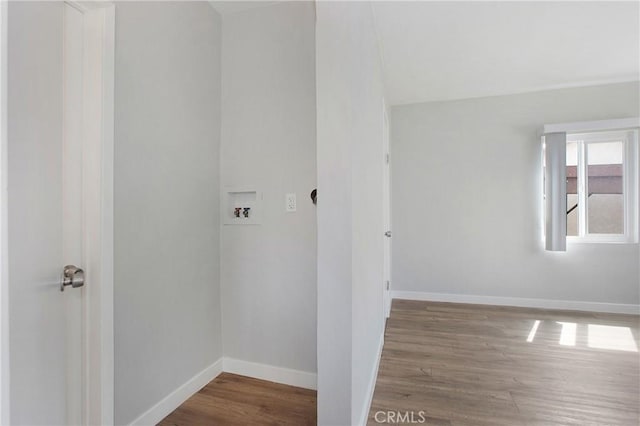 1435 E Colon St, Wilmington, CA 90744 - washroom featuring washer hookup and wood finished floors