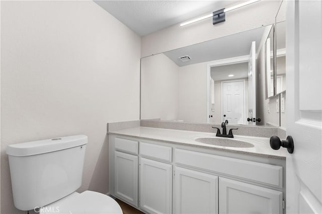 43441 30th St W Unit 3, Lancaster, CA 93536 - half bathroom featuring toilet and vanity
