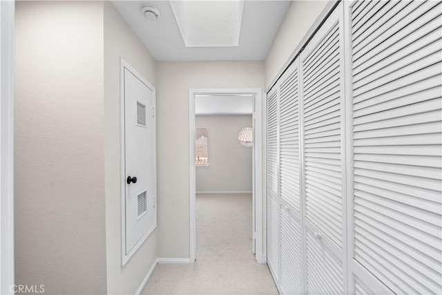 43441 30th St W Unit 3, Lancaster, CA 93536 - hallway featuring light colored carpet and baseboards