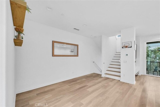 791 S Mosaic St, Anaheim, CA 92805 - spare room with light wood finished floors, stairs, and recessed lighting