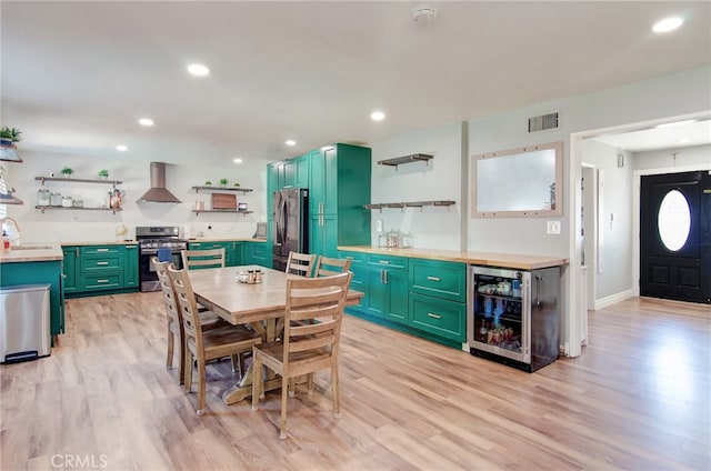 1523 Finegrove Ave, Hacienda Heights, CA 91745 - dining space with wine cooler, light wood-style floors, a bar, and recessed lighting