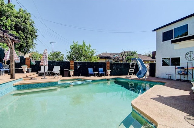 1523 Finegrove Ave, Hacienda Heights, CA 91745 - view of swimming pool featuring a water slide, a pool with connected hot tub, and a patio area
