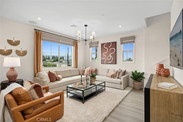 2601 Durfee Ave Unit H, El Monte, CA 91732 - living room with plenty of natural light, a chandelier, light wood-style flooring, and recessed lighting