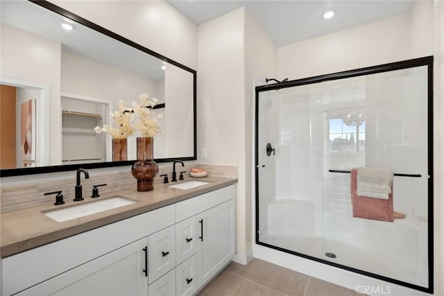 2601 Durfee Ave Unit H, El Monte, CA 91732 - full bathroom featuring a stall shower, double vanity, tile patterned flooring, and tasteful backsplash