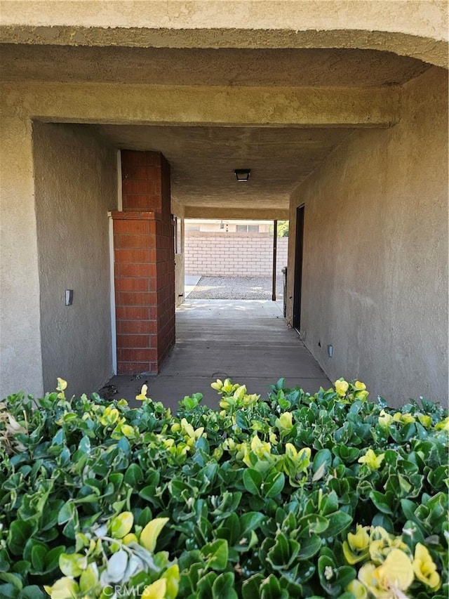 12546 Rain Shadow Rd, Victorville, CA 92395 - view of exterior entry with stucco siding