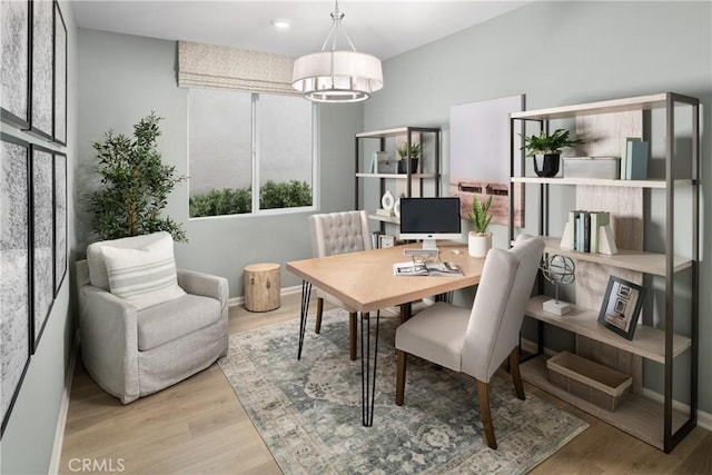 25172 Hunter Ave, Moreno Valley, CA 92551 - dining area with wood finished floors, an office area, a chandelier, and recessed lighting
