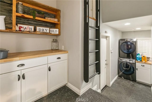 514 Riviera Dr, Lake Arrowhead, CA 92352 - washroom featuring stacked washing machine and dryer, cabinet space, and recessed lighting