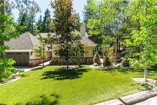 514 Riviera Dr, Lake Arrowhead, CA 92352 - view of green lawn with an attached garage