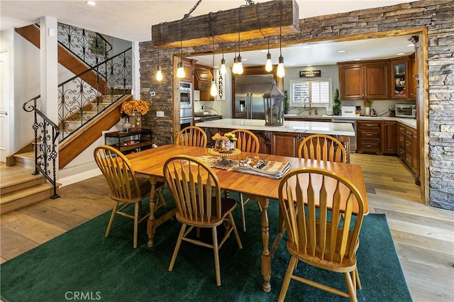 514 Riviera Dr, Lake Arrowhead, CA 92352 - dining area featuring light wood-style flooring, stairs, and recessed lighting