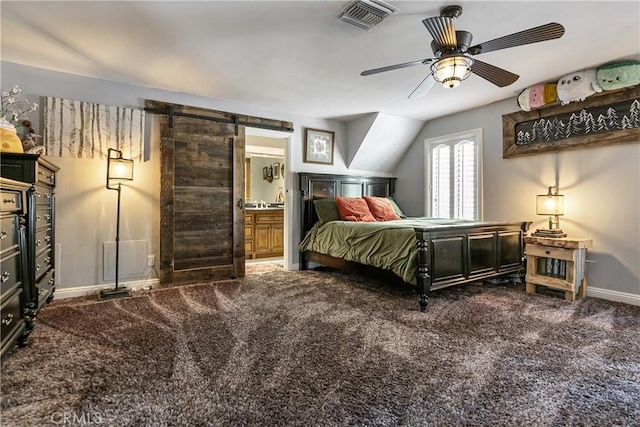 514 Riviera Dr, Lake Arrowhead, CA 92352 - bedroom with carpet floors, a barn door, connected bathroom, and a ceiling fan