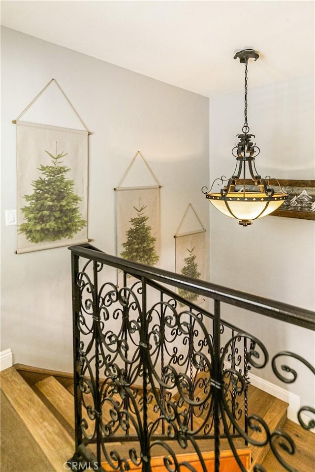 514 Riviera Dr, Lake Arrowhead, CA 92352 - staircase featuring wood finished floors and baseboards