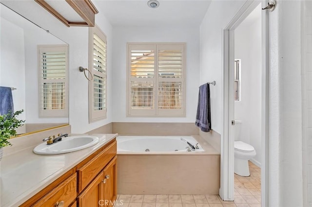658 Tusky Ave, Los Banos, CA 93635 - bathroom with a jetted tub and vanity