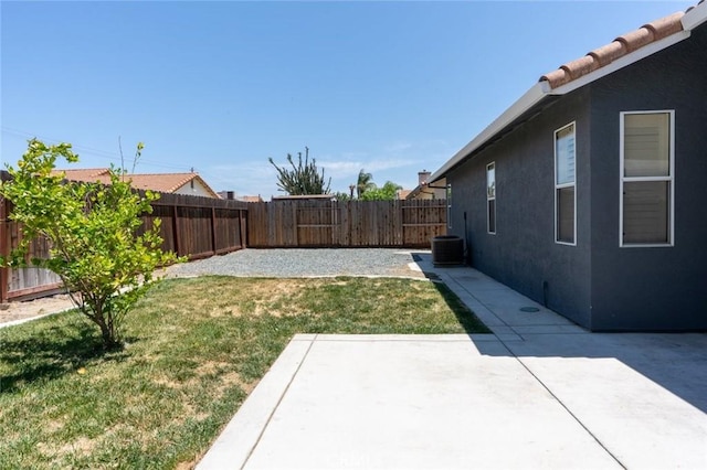 658 Tusky Ave, Los Banos, CA 93635 - fenced backyard with a patio area