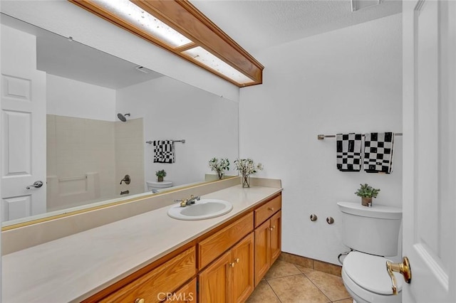 658 Tusky Ave, Los Banos, CA 93635 - bathroom featuring vanity, tile patterned floors, and shower / washtub combination