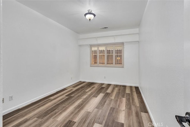 658 Tusky Ave, Los Banos, CA 93635 - unfurnished room featuring wood finished floors and baseboards