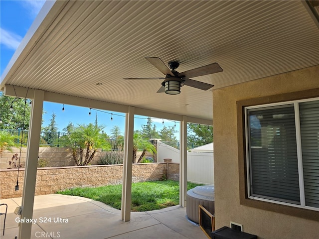 33853 Cansler Way, Yucaipa, CA 92399 - fenced backyard with a patio, a hot tub, and a ceiling fan