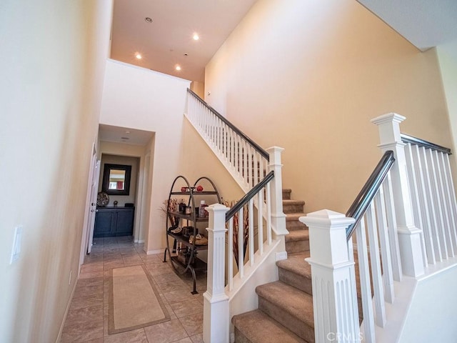 9275 Serenity St, Riverside, CA 92508 - stairs featuring a towering ceiling and recessed lighting