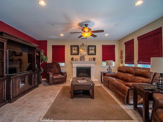 9275 Serenity St, Riverside, CA 92508 - living room featuring a ceiling fan, recessed lighting, a fireplace, and tile patterned flooring