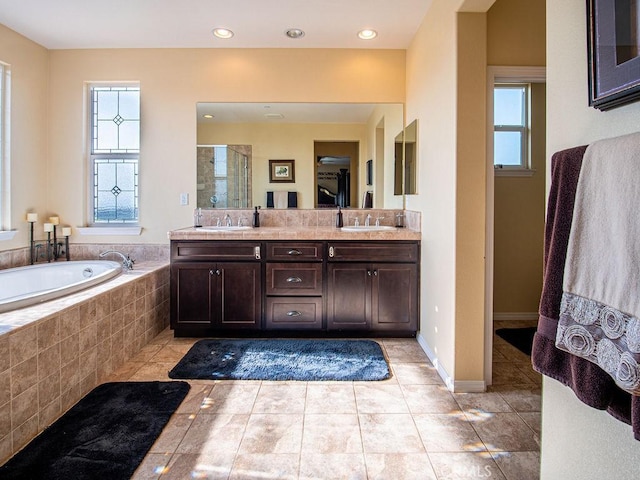 9275 Serenity St, Riverside, CA 92508 - bathroom featuring healthy amount of natural light, a shower stall, a bath, and tile patterned floors