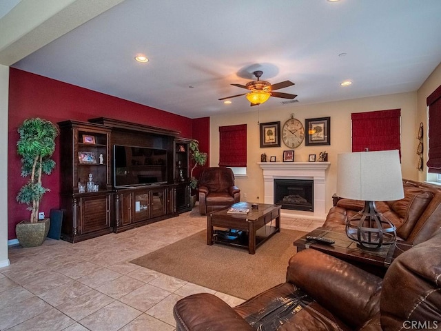 9275 Serenity St, Riverside, CA 92508 - living area featuring a ceiling fan, recessed lighting, a fireplace with raised hearth, and light tile patterned floors
