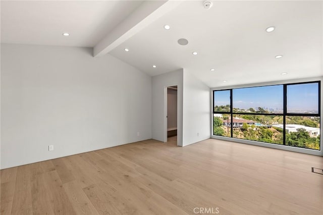 9336 Lloydcrest Dr, Beverly Hills, CA 90210 - empty room with expansive windows, light wood-type flooring, recessed lighting, and a smoke detector