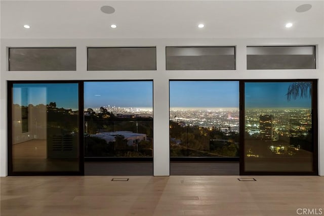 9336 Lloydcrest Dr, Beverly Hills, CA 90210 - unfurnished room with recessed lighting, wood finished floors, and a view of city