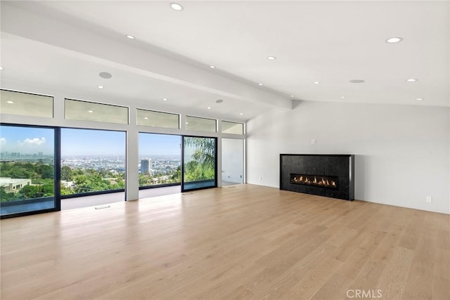 9336 Lloydcrest Dr, Beverly Hills, CA 90210 - unfurnished living room with light wood-style floors, plenty of natural light, a high end fireplace, and recessed lighting