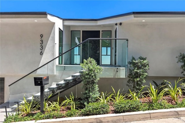 9336 Lloydcrest Dr, Beverly Hills, CA 90210 - view of home's exterior featuring stucco siding