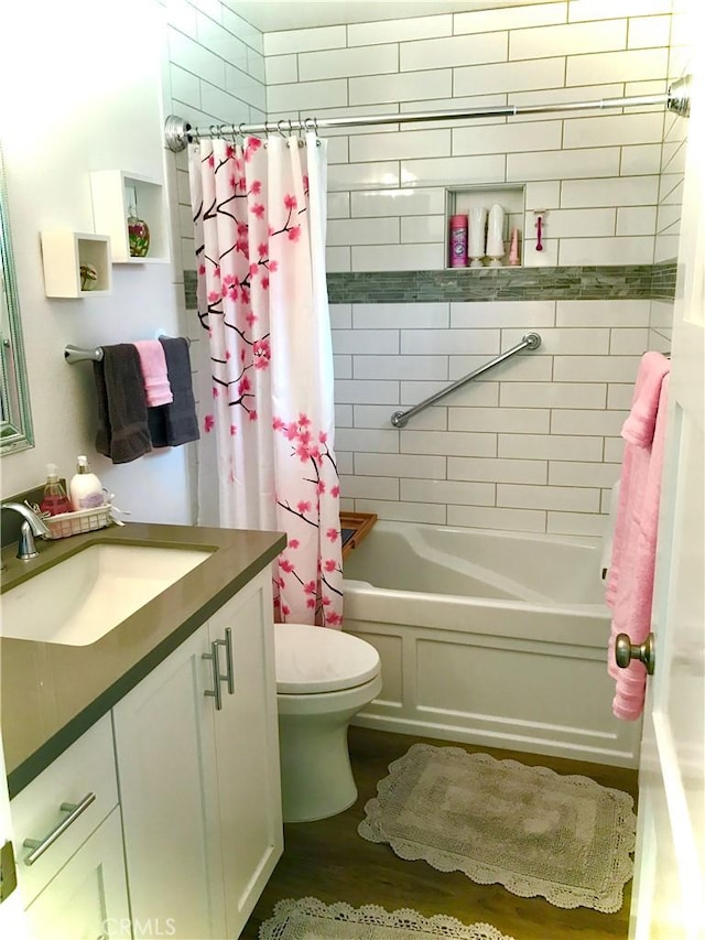 2577 Plaza Del Amo Unit 712, Torrance, CA 90503 - full bathroom with vanity, shower / bathtub combination with curtain, and wood finished floors