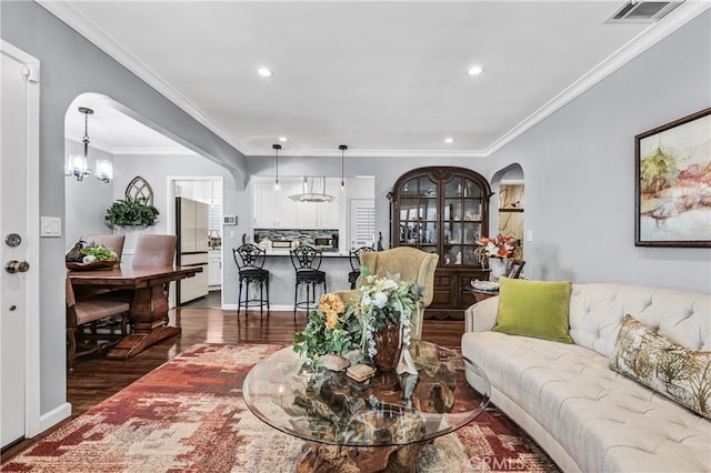 4708 W 132nd St, Hawthorne, CA 90250 - living room with wood finished floors, recessed lighting, ornamental molding, and arched walkways