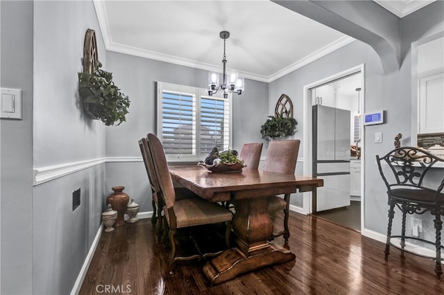 4708 W 132nd St, Hawthorne, CA 90250 - dining room featuring a chandelier, wood finished floors, and crown molding