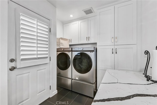 4708 W 132nd St, Hawthorne, CA 90250 - washroom with independent washer and dryer, cabinet space, dark tile patterned floors, and recessed lighting