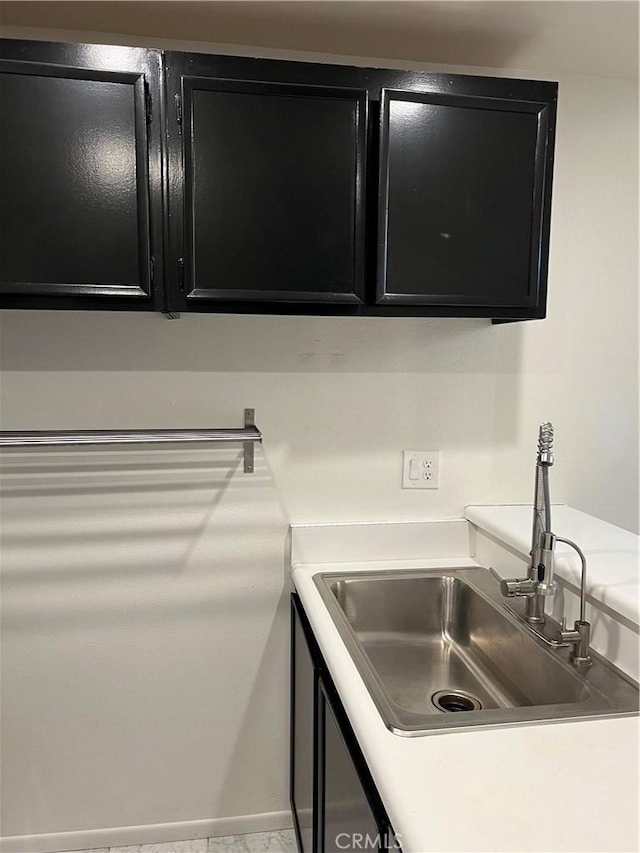 5257 Radford Ave Unit 308, Valley Village, CA 91607 - kitchen featuring dark cabinetry and light countertops