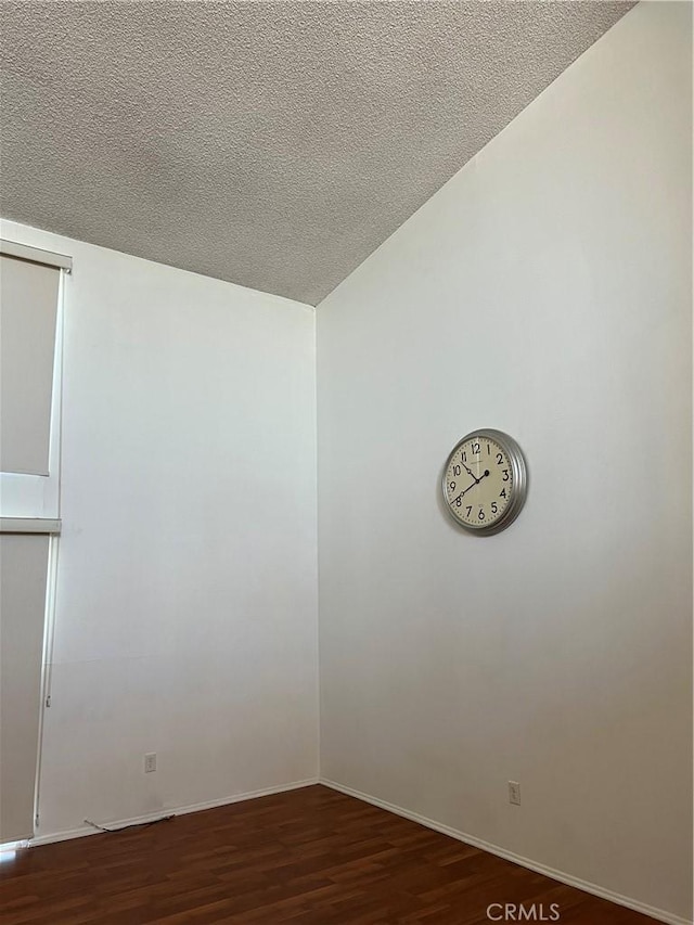 5257 Radford Ave Unit 308, Valley Village, CA 91607 - spare room with wood finished floors and a textured ceiling