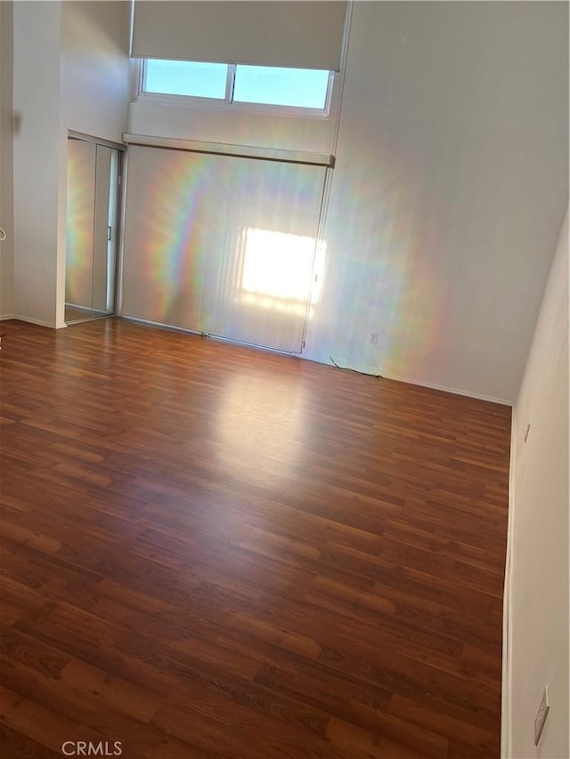 5257 Radford Ave Unit 308, Valley Village, CA 91607 - unfurnished room with wood finished floors and a high ceiling