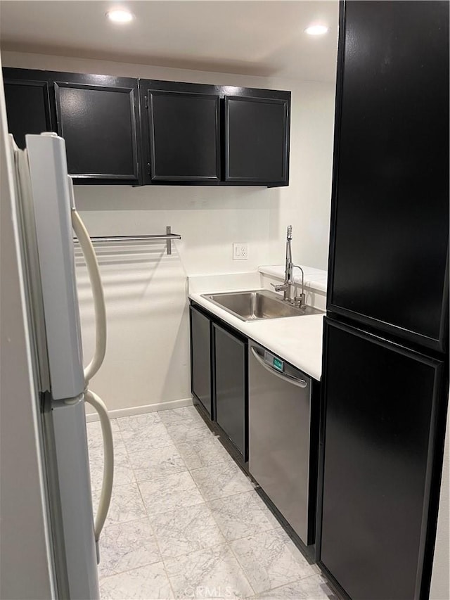5257 Radford Ave Unit 308, Valley Village, CA 91607 - kitchen featuring freestanding refrigerator, dark cabinets, stainless steel dishwasher, light countertops, and recessed lighting